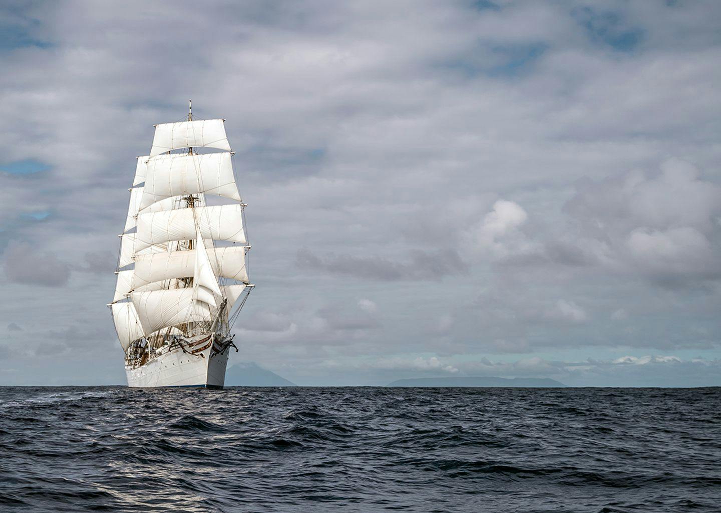 Statsraad Lehmkuhl with the volcano on Tofua in the background. Photo: Malin Kvamme